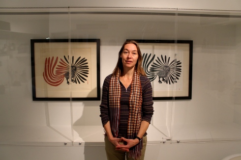 A MIA visitor stands by her favourite print in the museum.